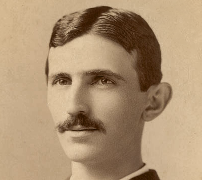 "Cabinet photo of Tesla in a head-and-shoulders pose"